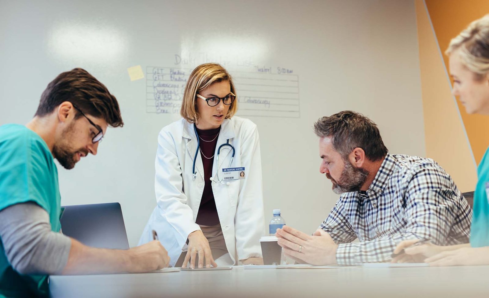 Medical-staff-having-conference-meeting-in-hospital-aspect-ratio-1600-975