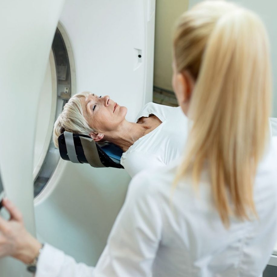 Mature-female-patient-undergoing-for-CT-scan-examination-in-the-hospita-aspect-ratio-1600-975
